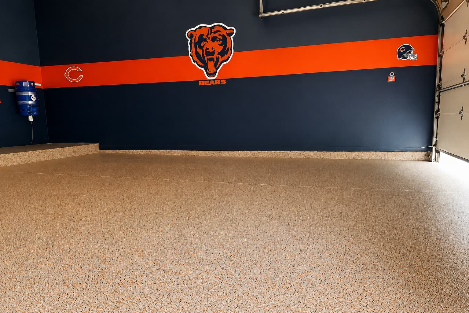 Finished full-flake garage floor with a custom Chicago Bears wall