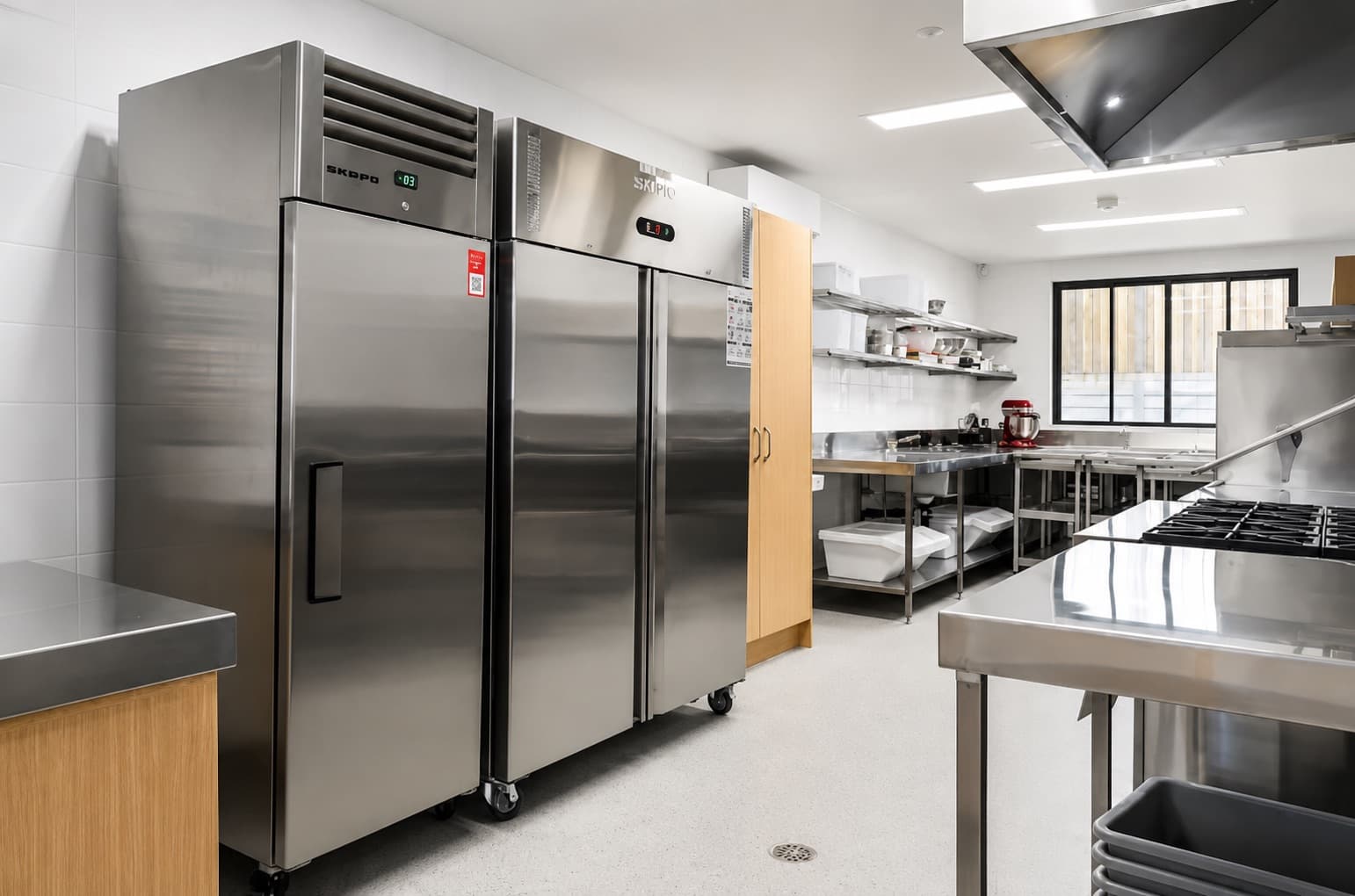 Commercial kitchen with seamless coated floor