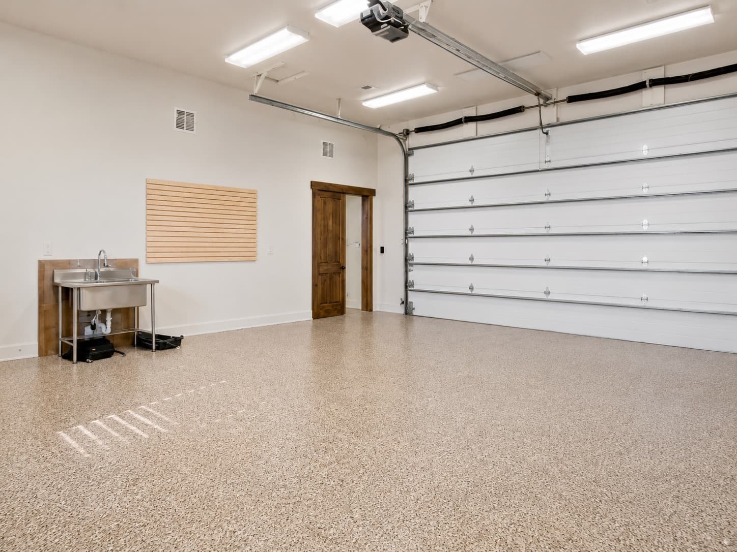 Garage with a fresh full-flake polyurea floor coating
